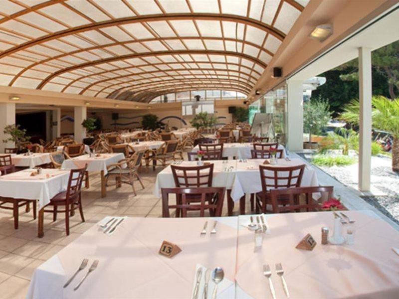 Poseidonia Aparthotel 4*