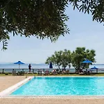 Pebbles And Sea At Barbati With Shared Pool