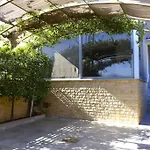 Golden House Paola