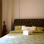 Golden House Paola