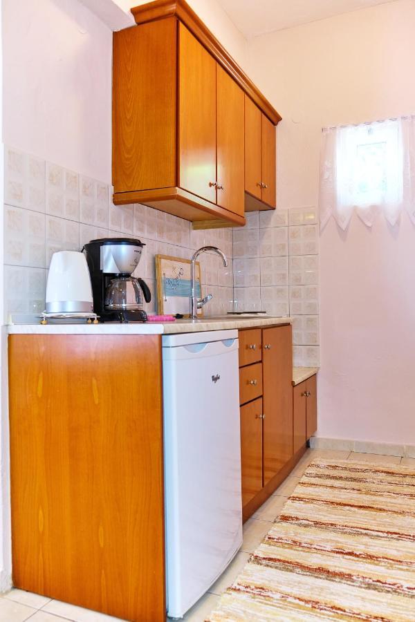 Houmis Apts & Guest house Agios Georgios Pagon
