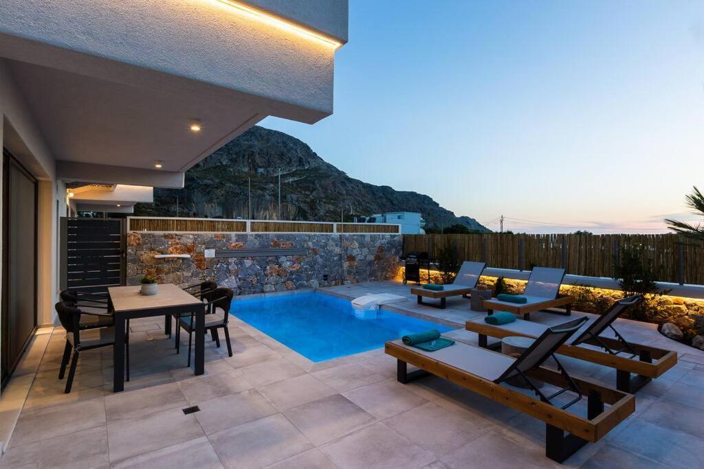 Holiday home Daphne-naiades/ 2 Bedrooms,luxury,beachfront *