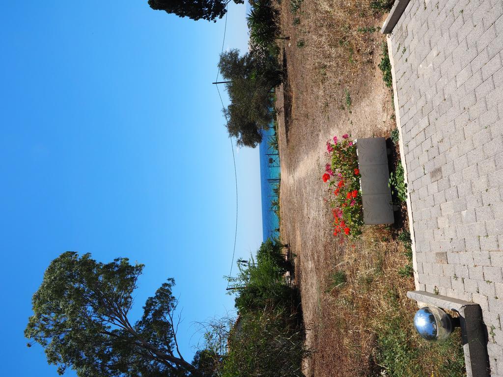Porto Assini Tolo
