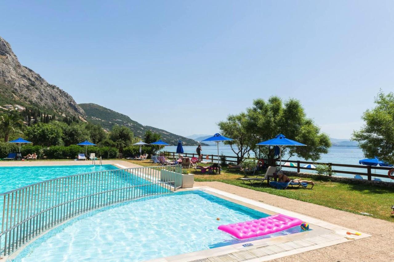 Pebbles And Sea At With Shared Pool Apartment