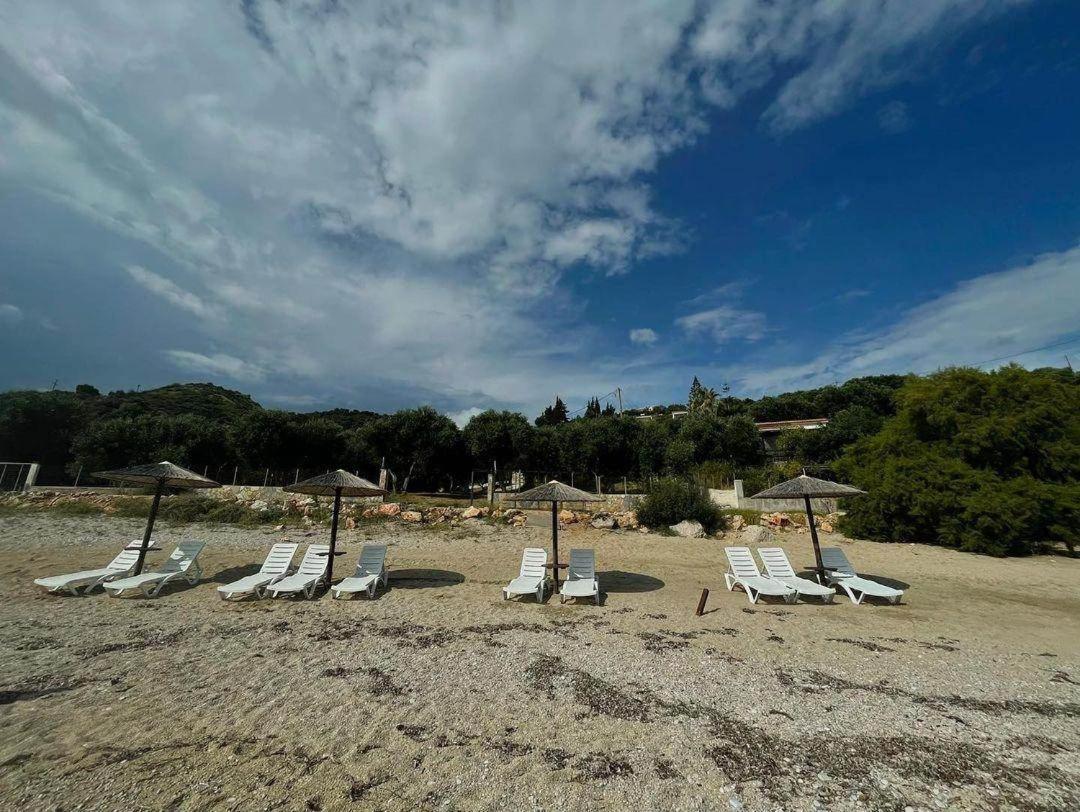 The Happiness Of Vangelis Paralia Vrachou