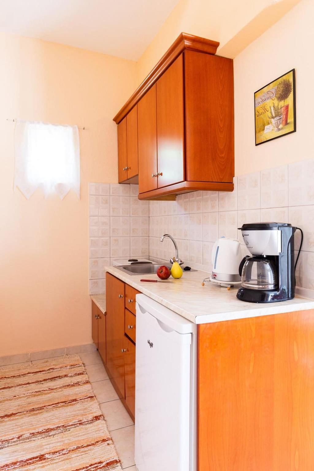 Guest house Houmis Apts & Agios Georgios Pagon