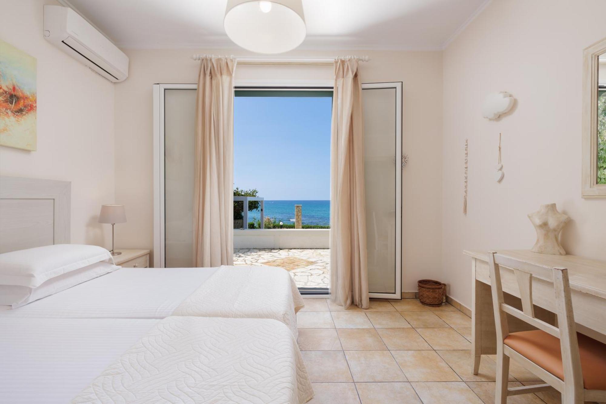Beachfront Dionysos - With Private Villa
