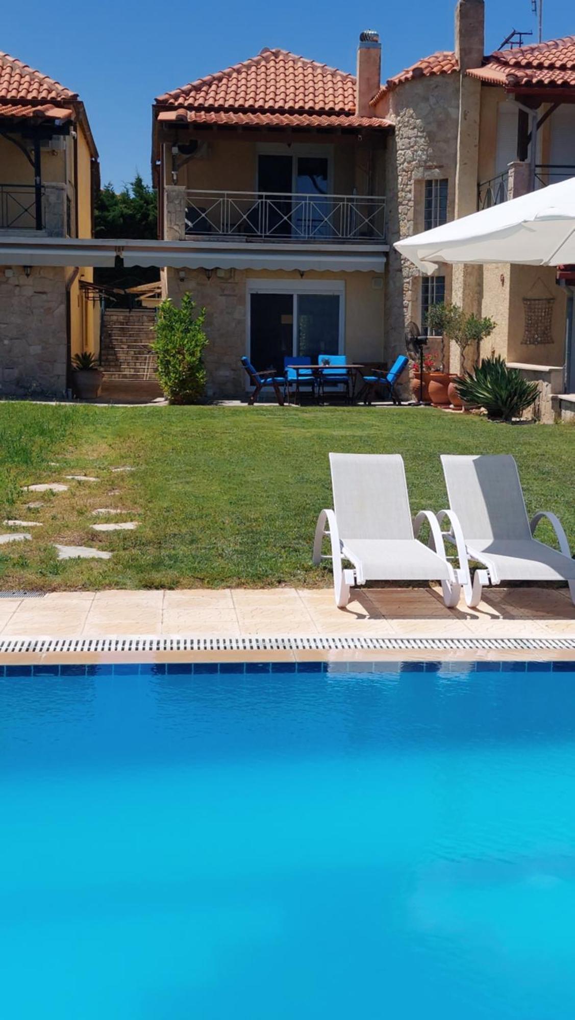 Blue Pastel-cliffside Villa, Shared Pool, Wild Sandy Nearby Holiday home Nea Poteidaia