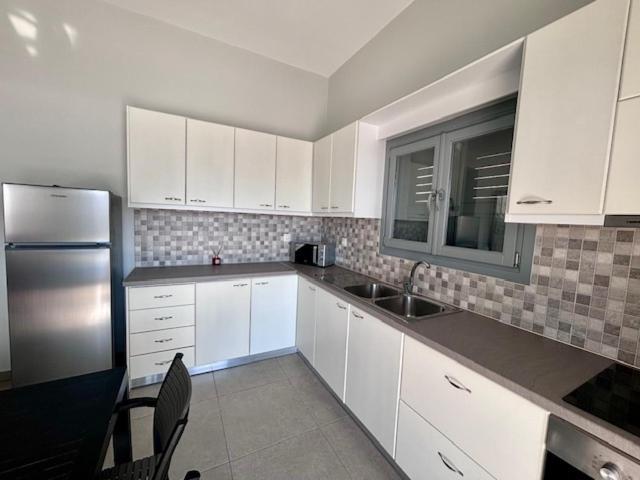Holiday home Three Olive Homes