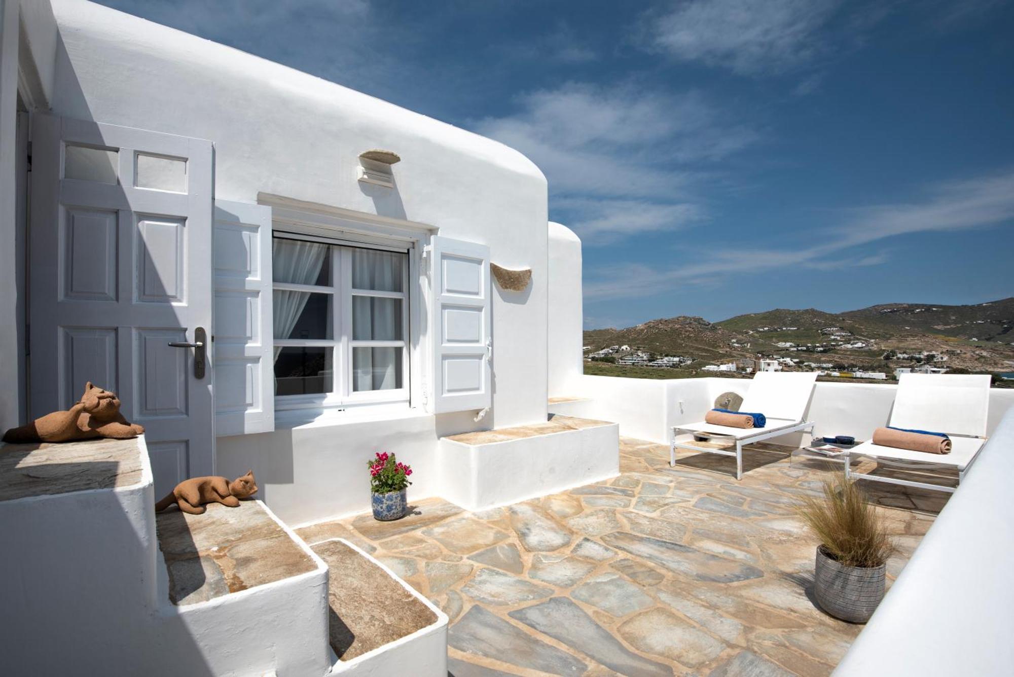Manu Mykonos Next To The Quality Brand &