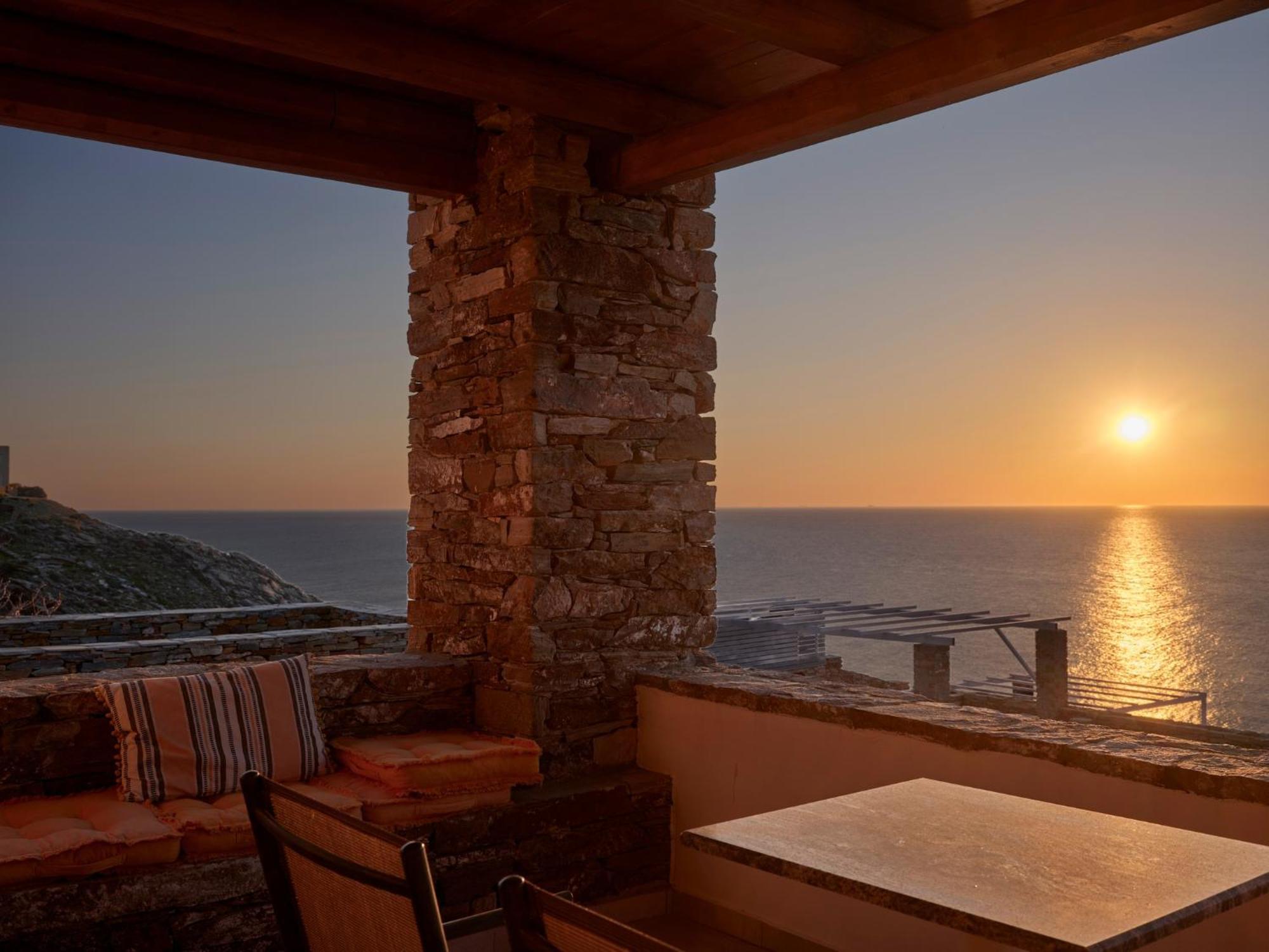Stone With A Sea Water Swimming Pool And A Sea And Sunset View