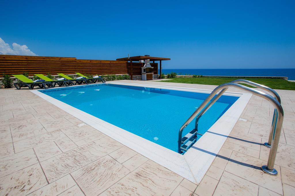 Villa Antonoglou - Waterfront Luxury Retreat