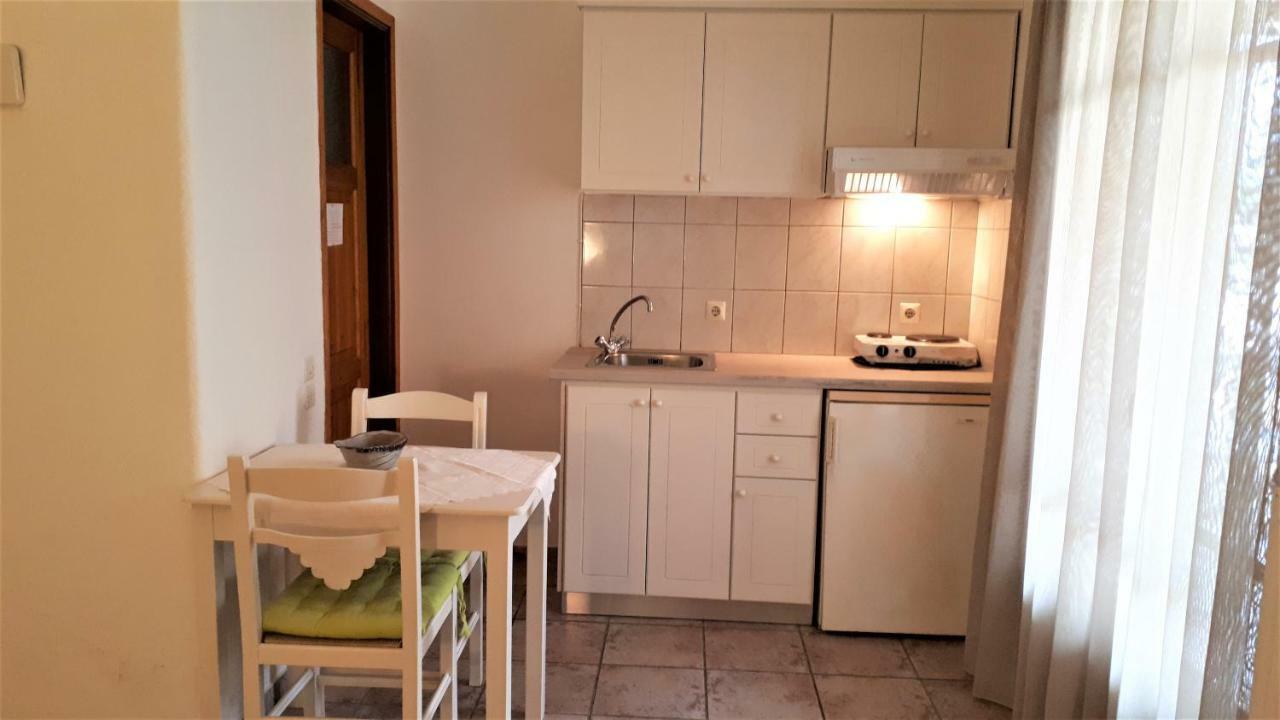 Apartment Ikos And *