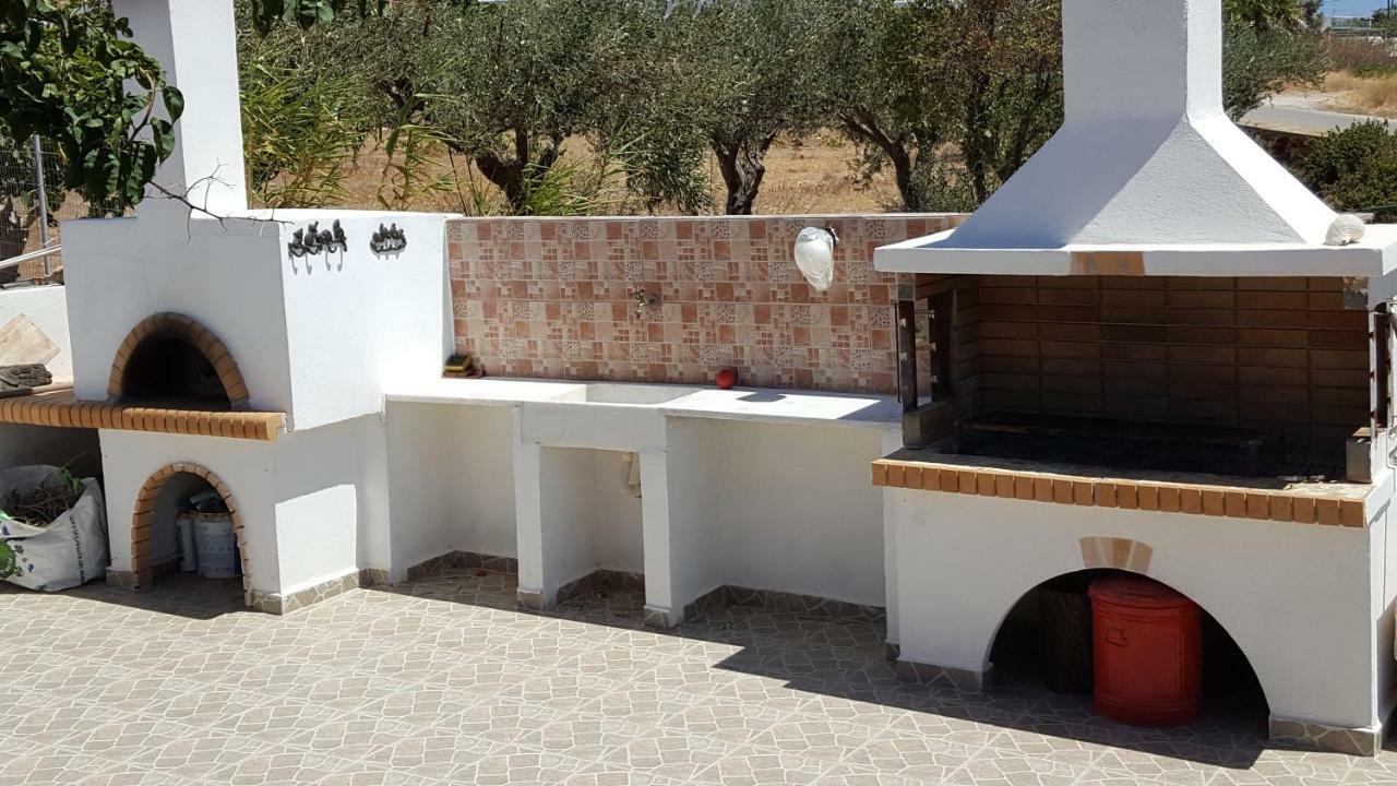 Flora's And Pool In Syros
