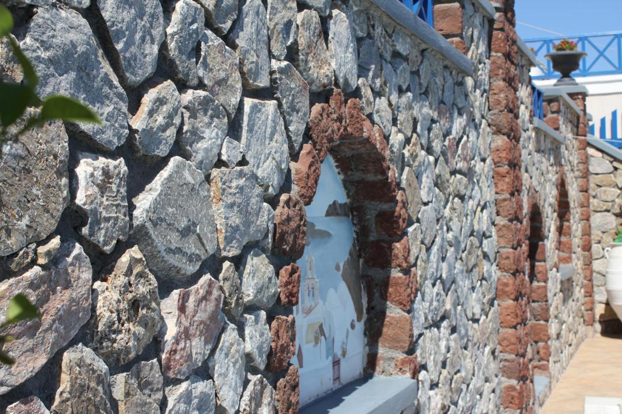 Thira Hotel *