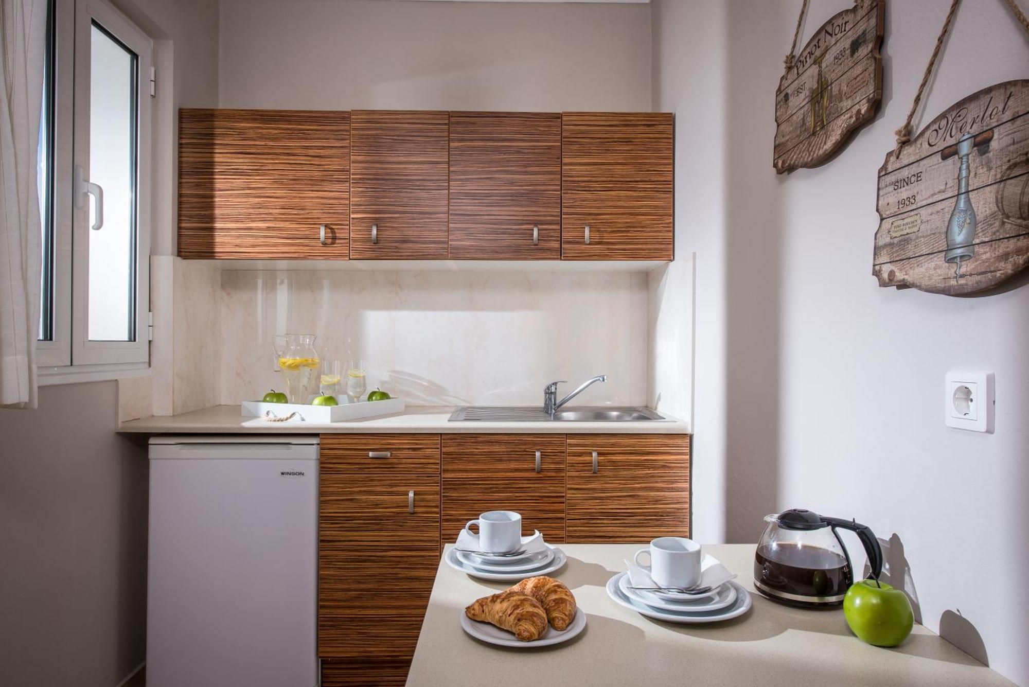 Ammos Boutique Apartments & Suites Hotel